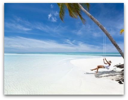 woman swinging beach framed