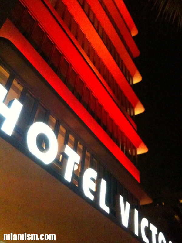 Hotel Victor on Ocean Drive in Miami Beach, a historic Art Deco landmark featuring elegant Streamline Moderne architecture and iconic neon lighting.